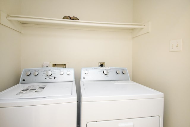 laundry room featuring washing machine and dryer