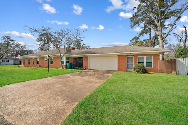 single story home with a garage and a front yard