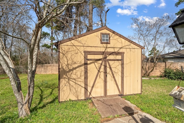 view of outdoor structure with a yard