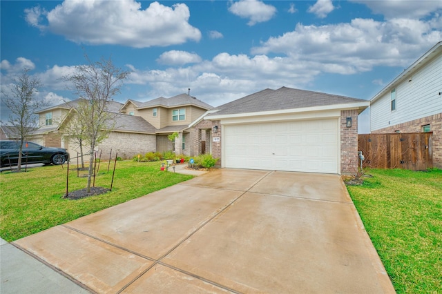 view of front of home with a garage and a front lawn