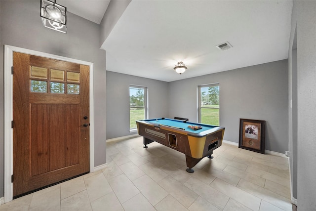 rec room featuring light tile patterned floors and billiards