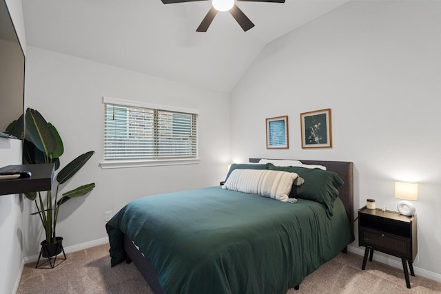 bedroom with carpet floors, ceiling fan, and vaulted ceiling