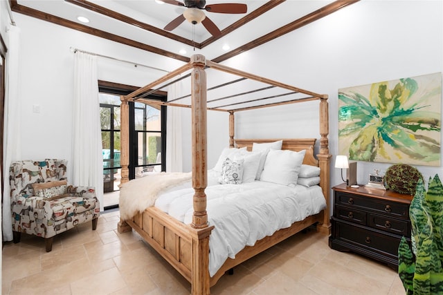 bedroom with stone tile floors and access to exterior