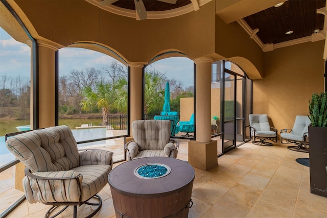 view of patio / terrace featuring an outdoor living space with a fire pit