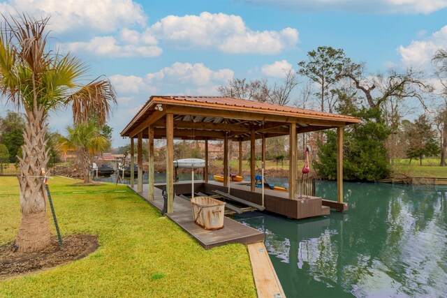 view of dock featuring a water view and a lawn