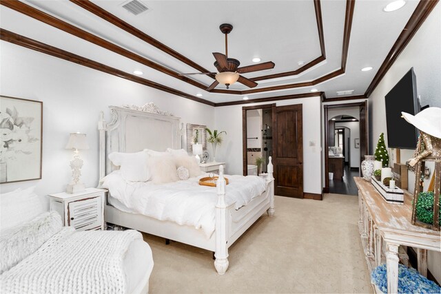 bedroom with arched walkways, recessed lighting, a raised ceiling, visible vents, and ornamental molding