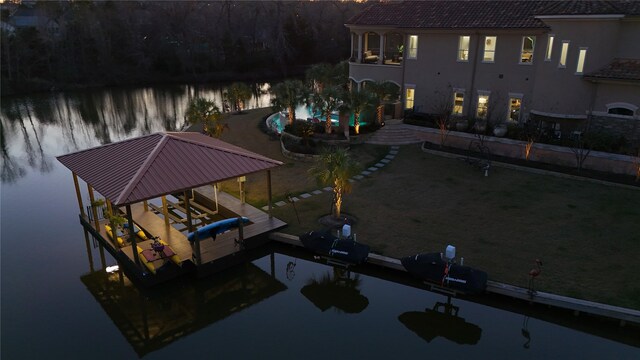 view of dock featuring a water view and boat lift