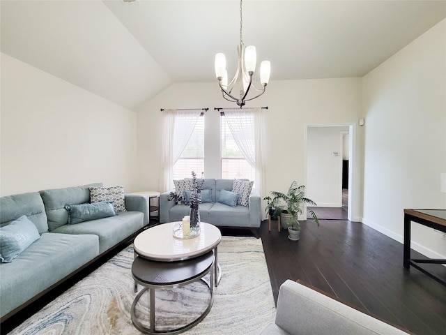 living room featuring lofted ceiling, a notable chandelier, and dark hardwood / wood-style flooring