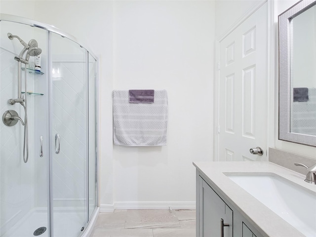 bathroom with vanity and walk in shower