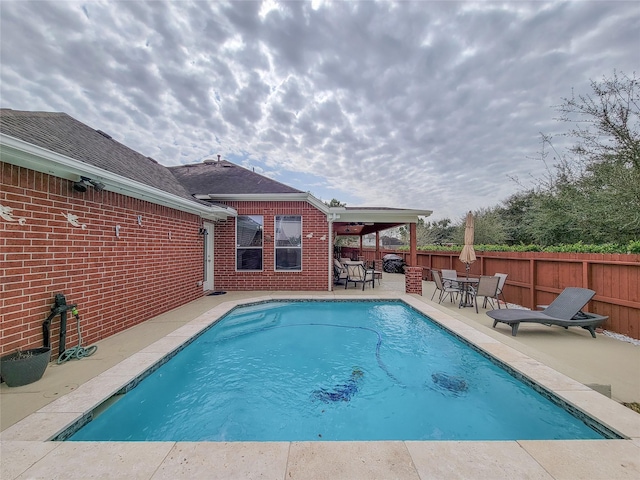 view of pool with a patio