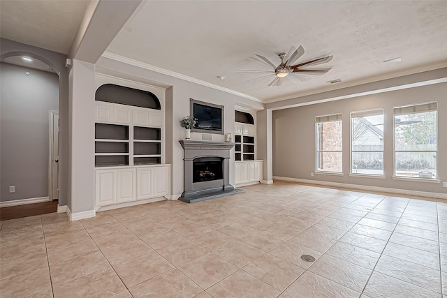 unfurnished living room with ornamental molding, light tile patterned floors, built in features, and ceiling fan