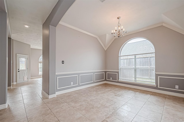 spare room featuring a notable chandelier, vaulted ceiling, and light tile patterned flooring