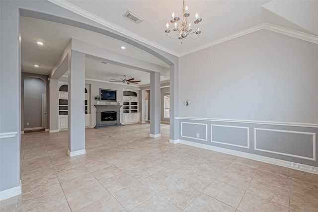 interior space with lofted ceiling, light tile patterned floors, crown molding, built in features, and ceiling fan with notable chandelier