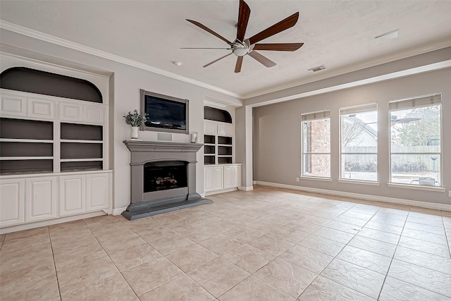 unfurnished living room featuring a textured ceiling, light tile patterned floors, ornamental molding, built in features, and ceiling fan