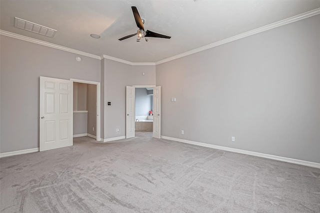 unfurnished bedroom with ceiling fan, ornamental molding, connected bathroom, and light carpet