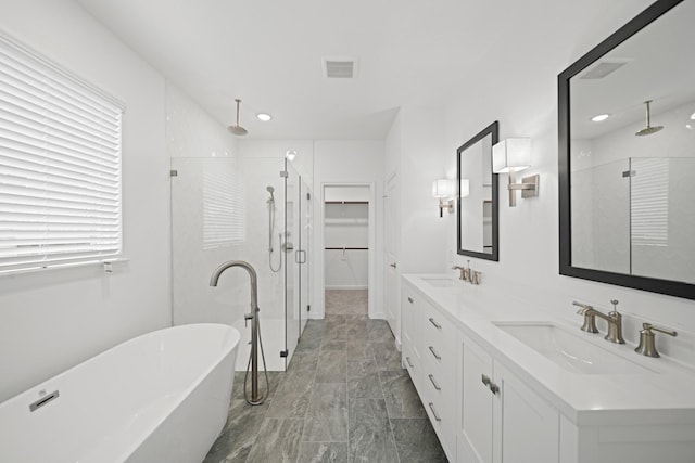 906 Hooks Trl, League City, TX 77573 - bathroom featuring shower with separate bathtub and vanity