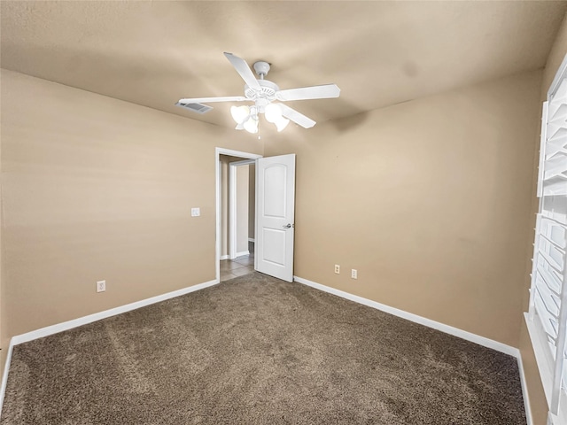 unfurnished bedroom featuring carpet floors and ceiling fan