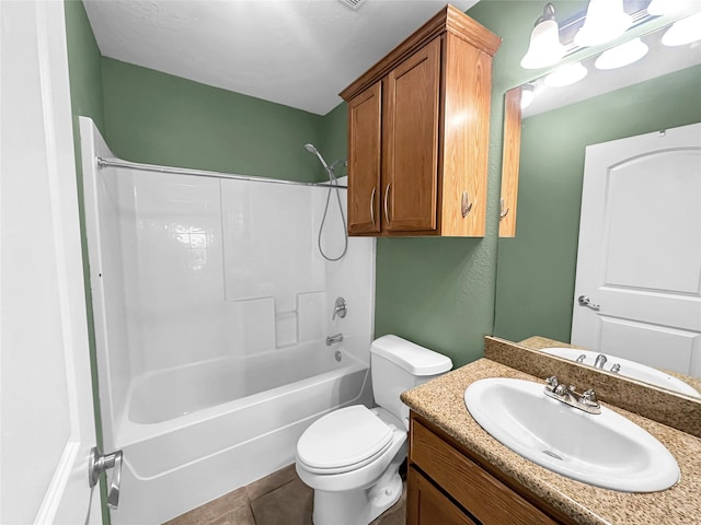 full bathroom with vanity, tub / shower combination, tile patterned floors, and toilet