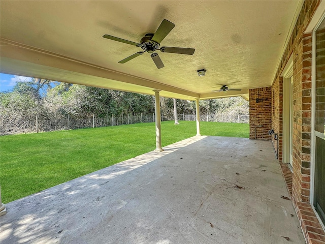 view of patio featuring ceiling fan