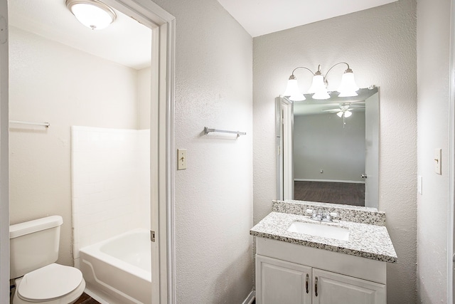 full bathroom featuring vanity, toilet, and separate shower and tub