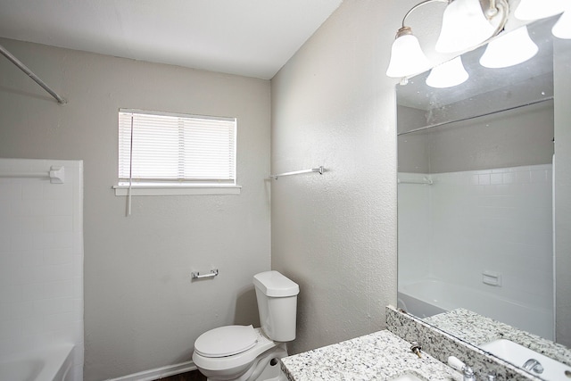 full bathroom featuring shower / tub combination, vanity, and toilet