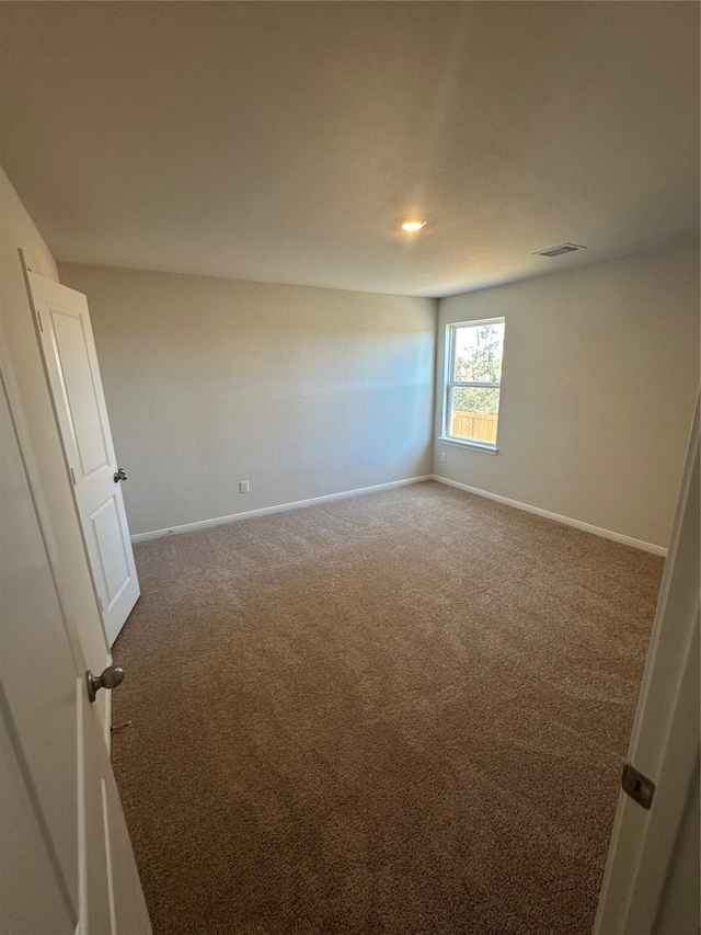 unfurnished bedroom with carpet floors