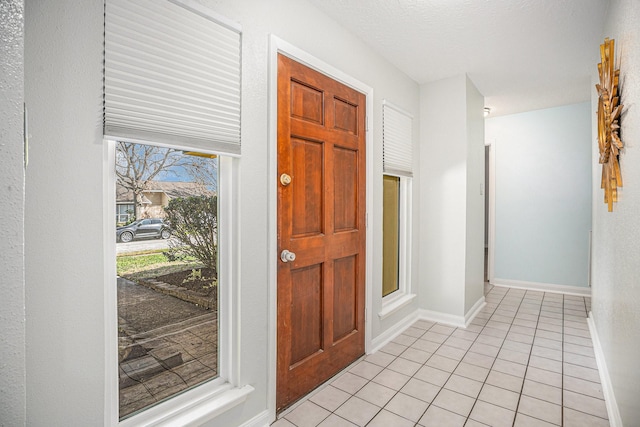 view of tiled entrance foyer