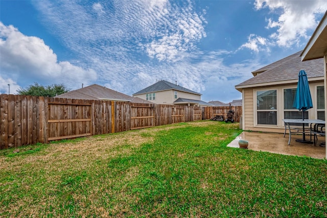 view of yard featuring a fenced backyard and a patio