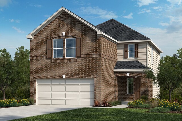 view of front property with a garage and a front lawn