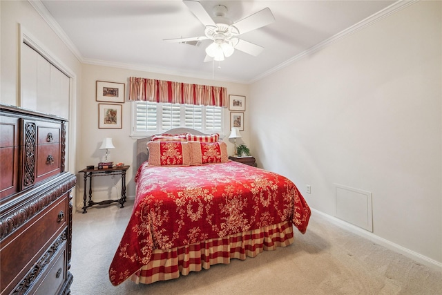 bedroom featuring ceiling fan, baseboards, carpet, and ornamental molding