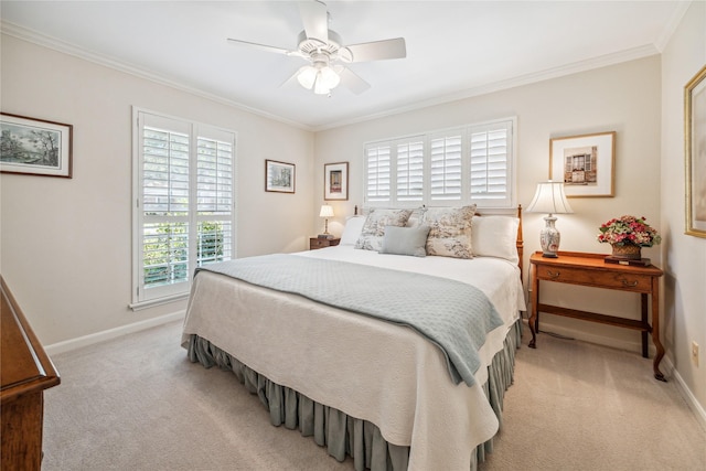 bedroom featuring light carpet, a ceiling fan, crown molding, and baseboards