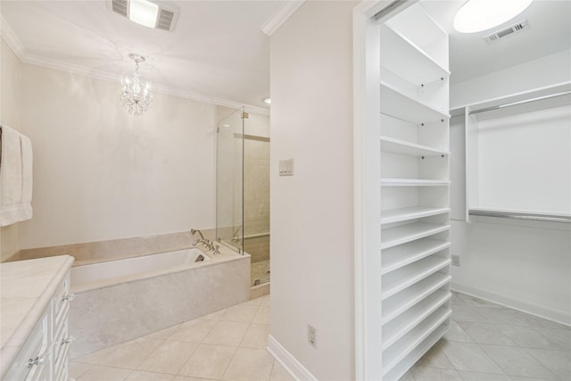 bathroom with visible vents and ornamental molding