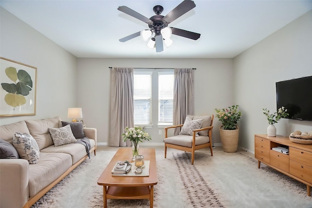 living room with light carpet and ceiling fan