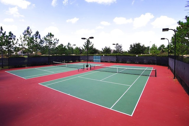 view of sport court with community basketball court and fence