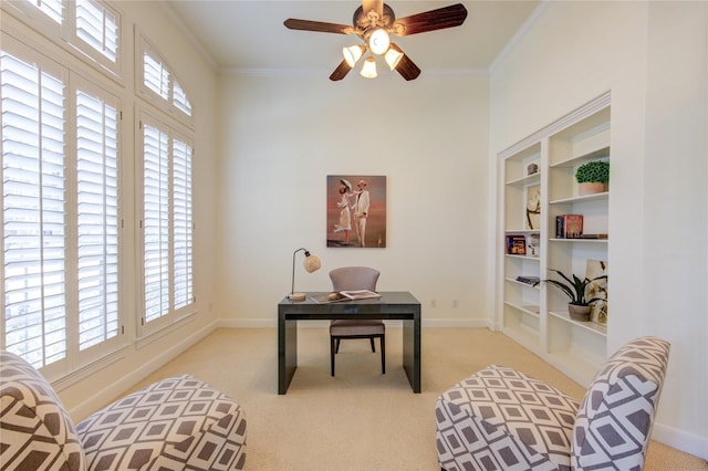 office featuring carpet floors, baseboards, and crown molding