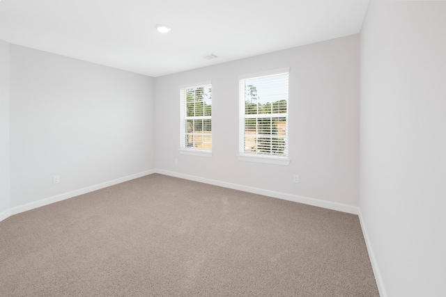 unfurnished room with carpet