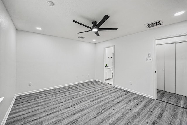 unfurnished bedroom with light wood-type flooring, visible vents, and recessed lighting