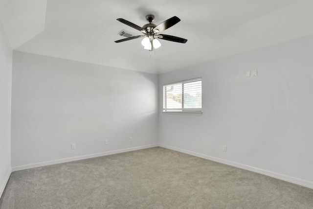 unfurnished room with ceiling fan and light colored carpet