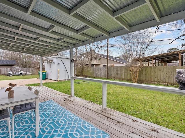 view of patio with a shed and a deck