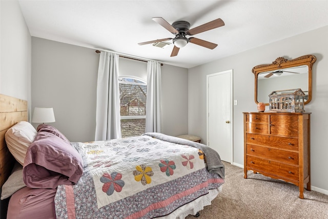 2203 Blossom Creek Dr, Houston, TX 77339 - carpeted bedroom with ceiling fan and baseboards