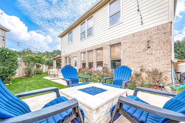 view of patio with an outdoor fire pit