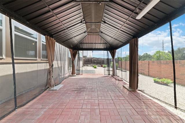 view of home's community with a gazebo and a patio