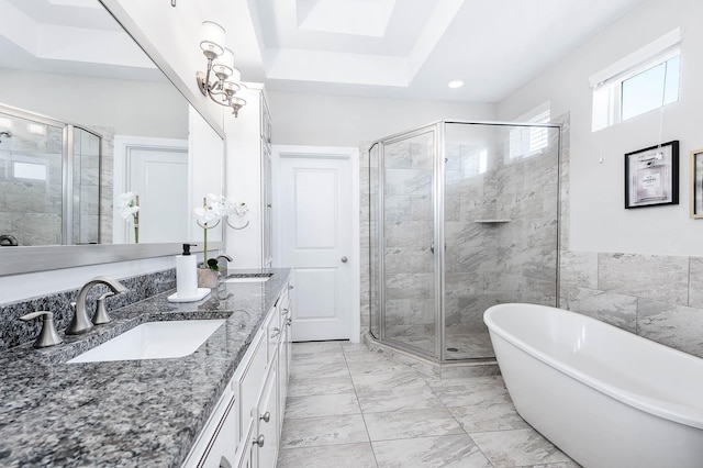 bathroom featuring independent shower and bath and vanity