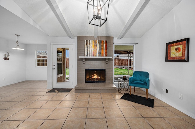 tiled living room with a fireplace, a textured ceiling, and vaulted ceiling with beams