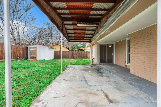 view of patio / terrace with a storage shed