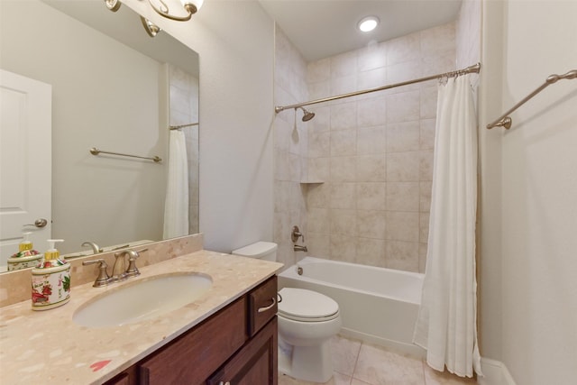 full bathroom with tile patterned floors, toilet, shower / bath combo with shower curtain, and vanity