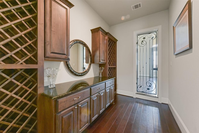 interior space with dark wood-type flooring