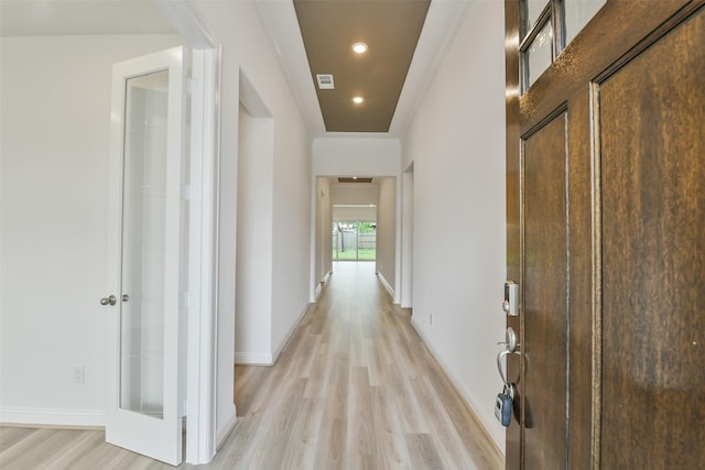 16119 Rustling Woods Rd, Conroe, TX 77302 - corridor with light wood-type flooring and recessed lighting