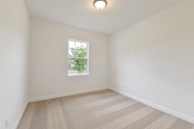 16119 Rustling Woods Rd, Conroe, TX 77302 - spare room with light carpet and baseboards