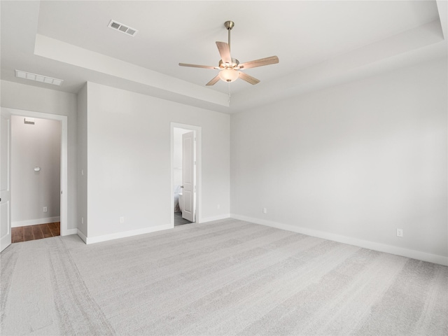 10903 Providence Ct, Missouri City, TX 77459 - carpeted spare room featuring a tray ceiling and ceiling fan